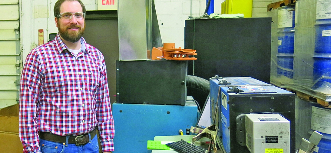 Laser engraver making a mark for Seco Machine